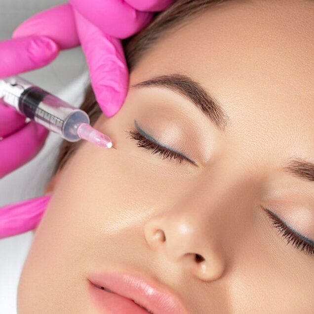 Model receiving a beauty treatment